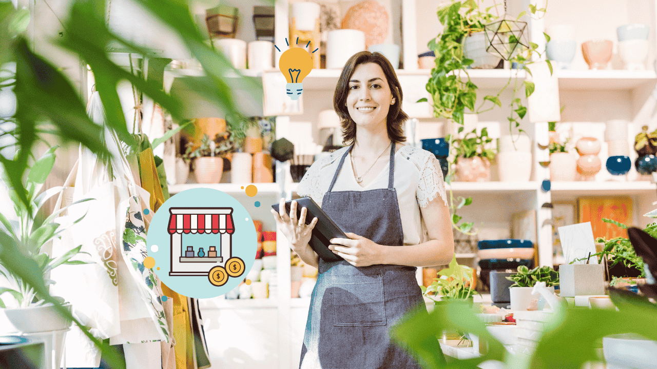 Small business owner reviewing online tools and guides to grow the business