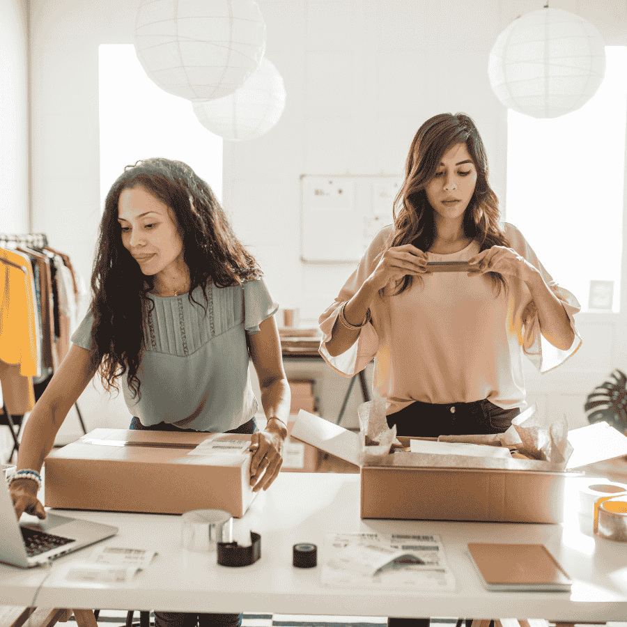 Small business women owner reviewing online tools and guides to grow the business